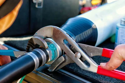 Pipe repair service using professional plumbing tools in Tarpon Springs, Florida